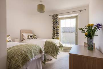 This bedroom can be made up as a king-size double bed or two singles (2ft 6in suitable for children).