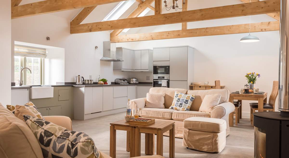 The fabulous open plan living space with exposed beams.