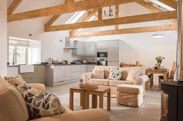The fabulous open plan living space with exposed beams.