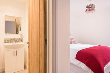 The master bedroom has an en suite bathroom.