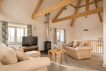The under-floor heating will keep you cosy but for an extra glow, fire up the stylish wood-burner.