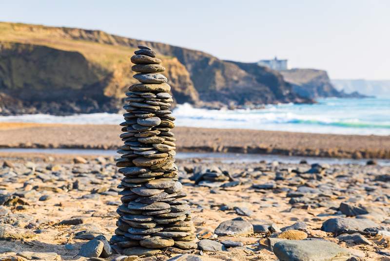 This lovely unspoilt beach, where you can spend time building pebble towers, sand castles or getting wet.