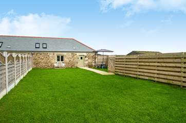 Enjoy relaxing in the large garden, perhaps a summer barbecue?
