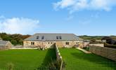 The Bull Pen is the barn on the right of the picture and has parking alongside the garden and  views over the farmyard and fields beyond.  - Thumbnail Image