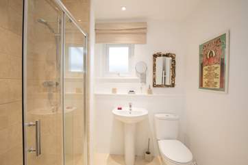 Wash away the mud from your walks or sand from the beach in the shower-room.