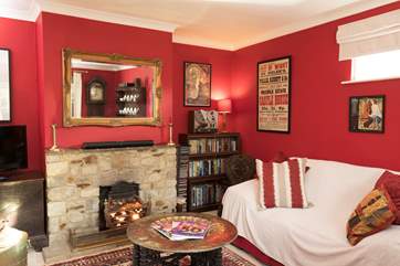 If the weather isn't enticing you, you could snuggle up and put on a film (please note the electric fire is no longer available).