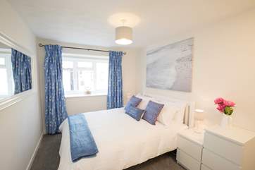 Wake up refreshed after a good night's sleep in the super-king size bed.