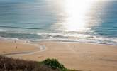 The sandy beach in all its glory at low tide. - Thumbnail Image