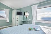 Bedroom 1 is double-aspect so really does embrace the wonderful setting.