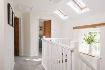 The three bedrooms and the bathroom and shower-room are off the landing on the first floor.