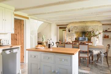 The stairs from the dining-area lead to the bedrooms and bathrooms.