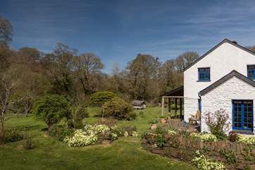 The large garden has many hidden areas waiting to be discovered.