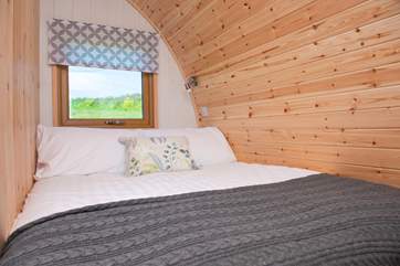 The comfortable double bed.