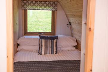 With a window at the back looking out to the pretty meadow.