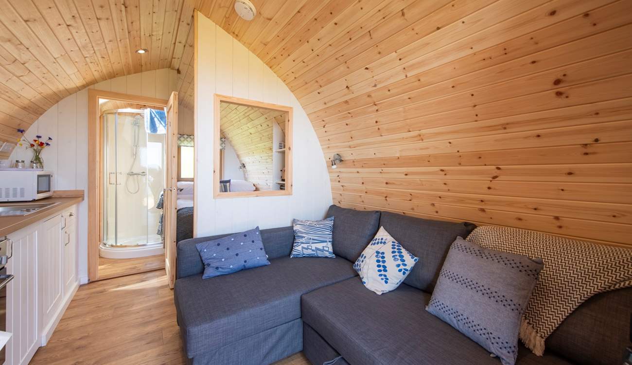 The very comfortable sofa converts into a huge double bed, which also enjoys those spectacular views.