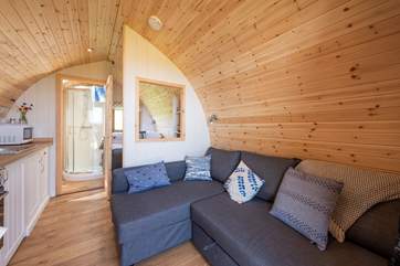 The very comfortable sofa converts into a huge double bed, which also enjoys those spectacular views.