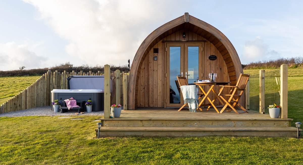 The gorgeous hot tub is tucked to the side of the pod, creating complete privacy. 