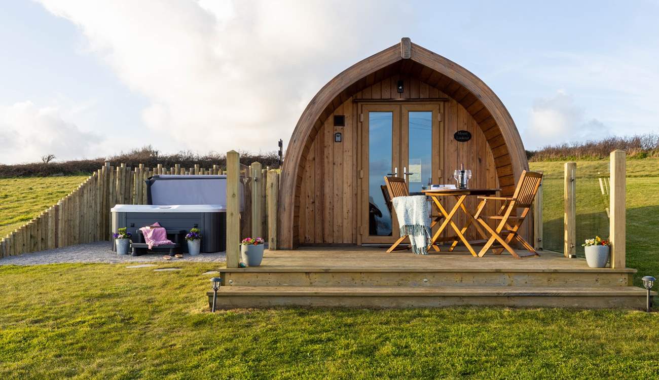The gorgeous hot tub is tucked to the side of the pod, creating complete privacy. 