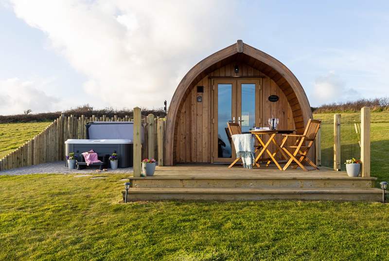 The gorgeous hot tub is tucked to the side of the pod, creating complete privacy. 