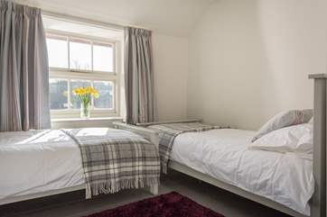 Bedroom 3 has twin beds.