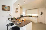 The impressive kitchen/dining area is a fabulous place for entertaining and cooking.