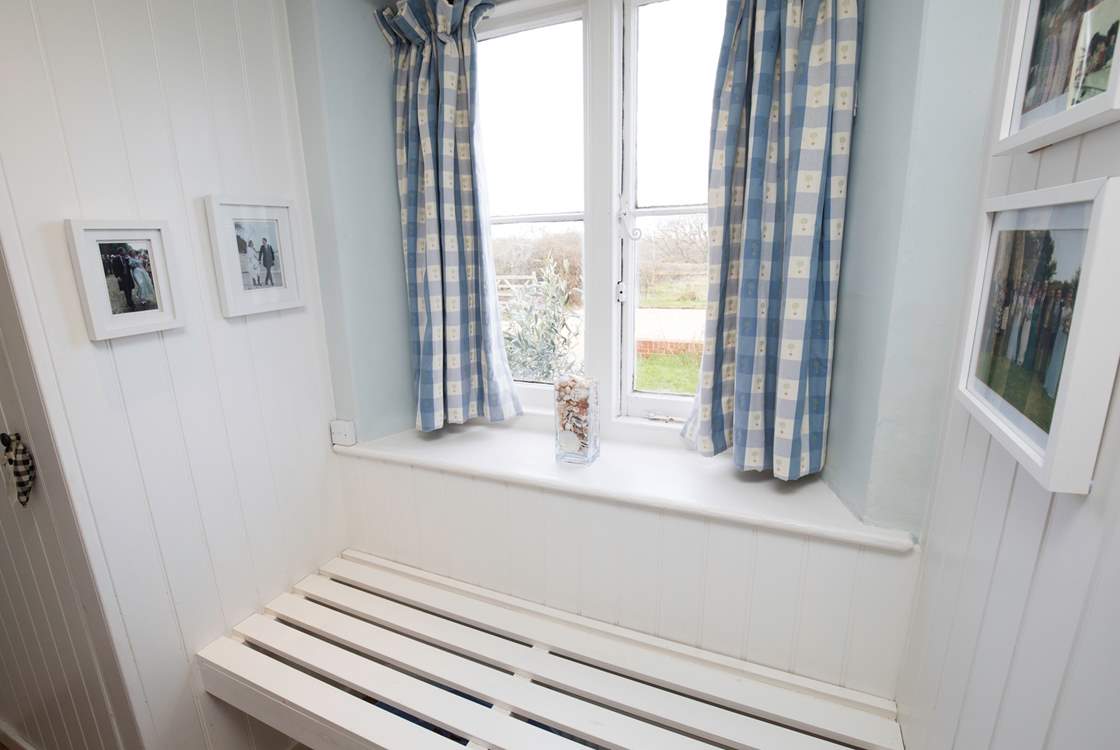 Take off your muddy walking shoes or sandy flip-flops in the downstairs utility-room/shower-room.