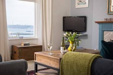 Three windows in the first floor sitting-room take in the panoramic views.