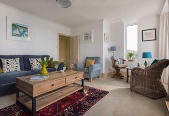 The sitting-room stretches the width of the cottage.
