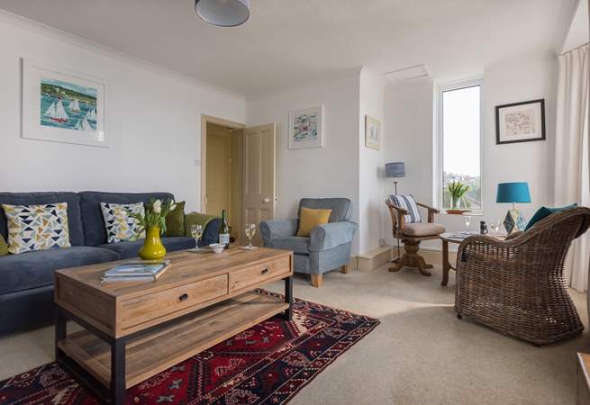 The sitting-room stretches the width of the cottage.