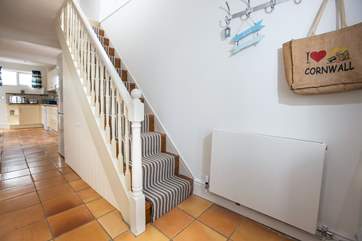 The steep stairs lead to the sitting room which has amazing views, along with the family shower room and second bedroom.