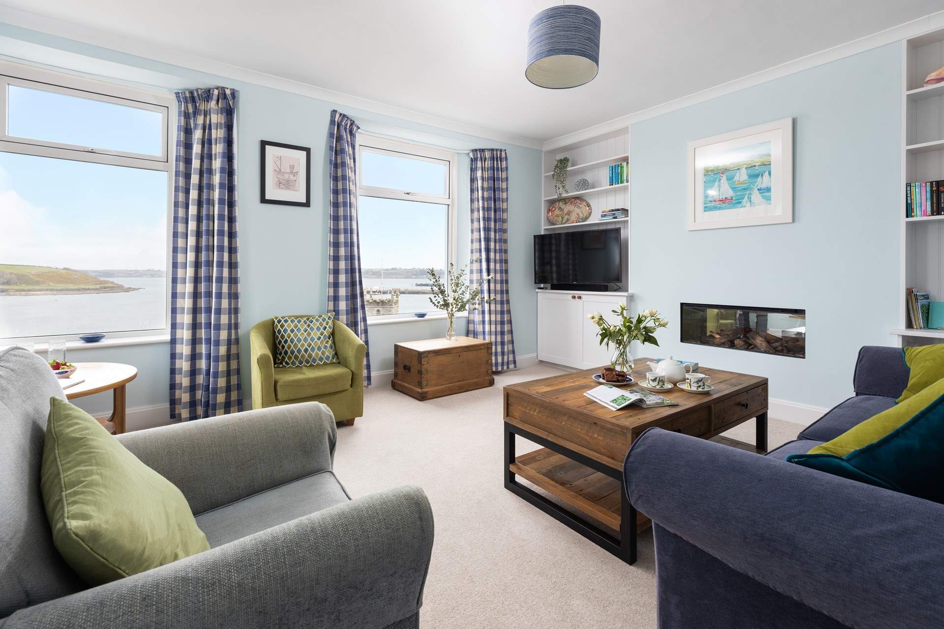 The first floor sitting-room embraces the wonderful views.