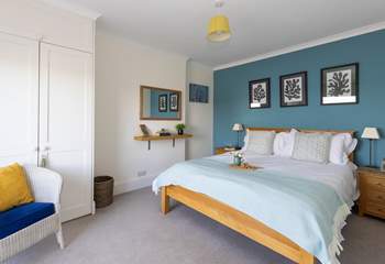Relax in style in the king-size bed. 
