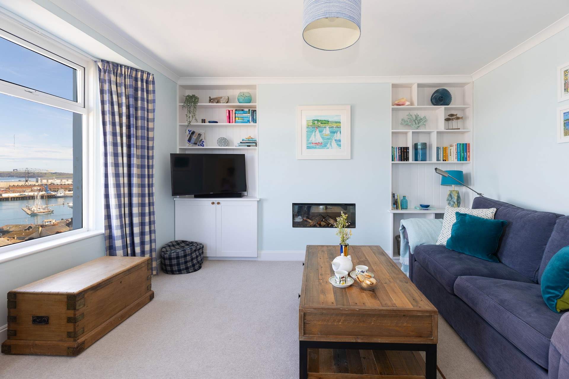 Turn on the electric fire and snuggle up watching the light changing on the water. 