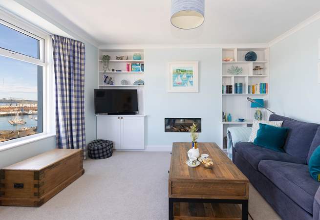 Turn on the electric fire and snuggle up watching the light changing on the water. 