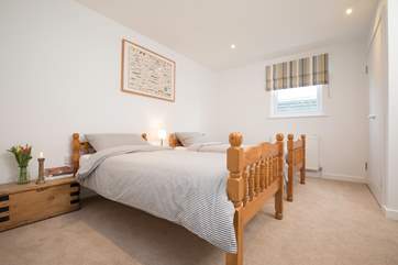 This lovely twin bedroom is very warm and cosy.