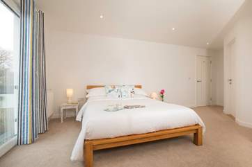This double bedroom with Juliet balcony is very light and has views over the nature reserve...