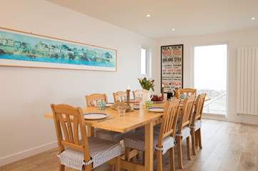 This light and airy dining-area has amazing views overlooking the sea.