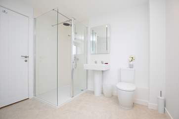 On the lower ground floor this bathroom with separate shower is perfect for hosing yourself down after a day on the beach.
