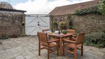 The courtyard garden is south-facing, making it a real sun-trap. Fully enclosed, the area makes a fantastic space for children and dogs to safely explore.