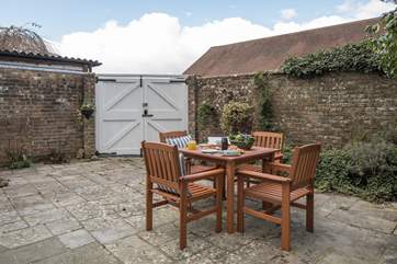 The courtyard garden is south-facing, making it a real sun-trap. Fully enclosed, the area makes a fantastic space for children and dogs to safely explore.