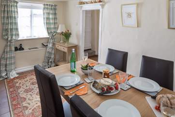 The dining-room is completely separate from the sitting-room, ideal for long lazy meals.