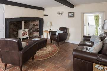 The kitchen and bathroom are down one step at the back of the sitting-room, the beam there is low, so please take care.