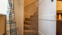 A view of the stairs with the traditional door. Should you wish to use a stair-gate, you will need to place it at the door of the twin room. 