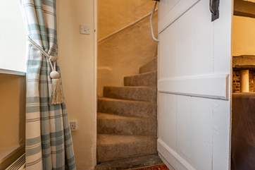 A view of the stairs with the traditional door. Should you wish to use a stair-gate, you will need to place it at the door of the twin room.