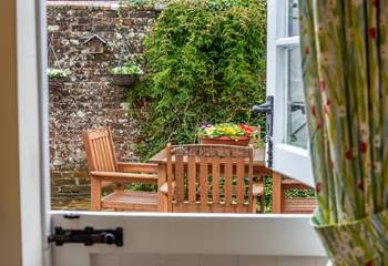 The kitchen has a characterful stable-door leading out to the pretty courtyard.