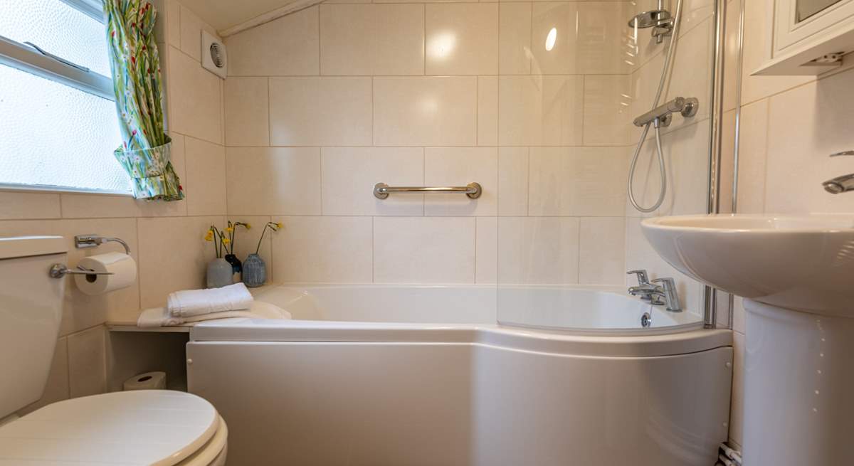 The modern ground-floor bathroom is a lovely bright space.