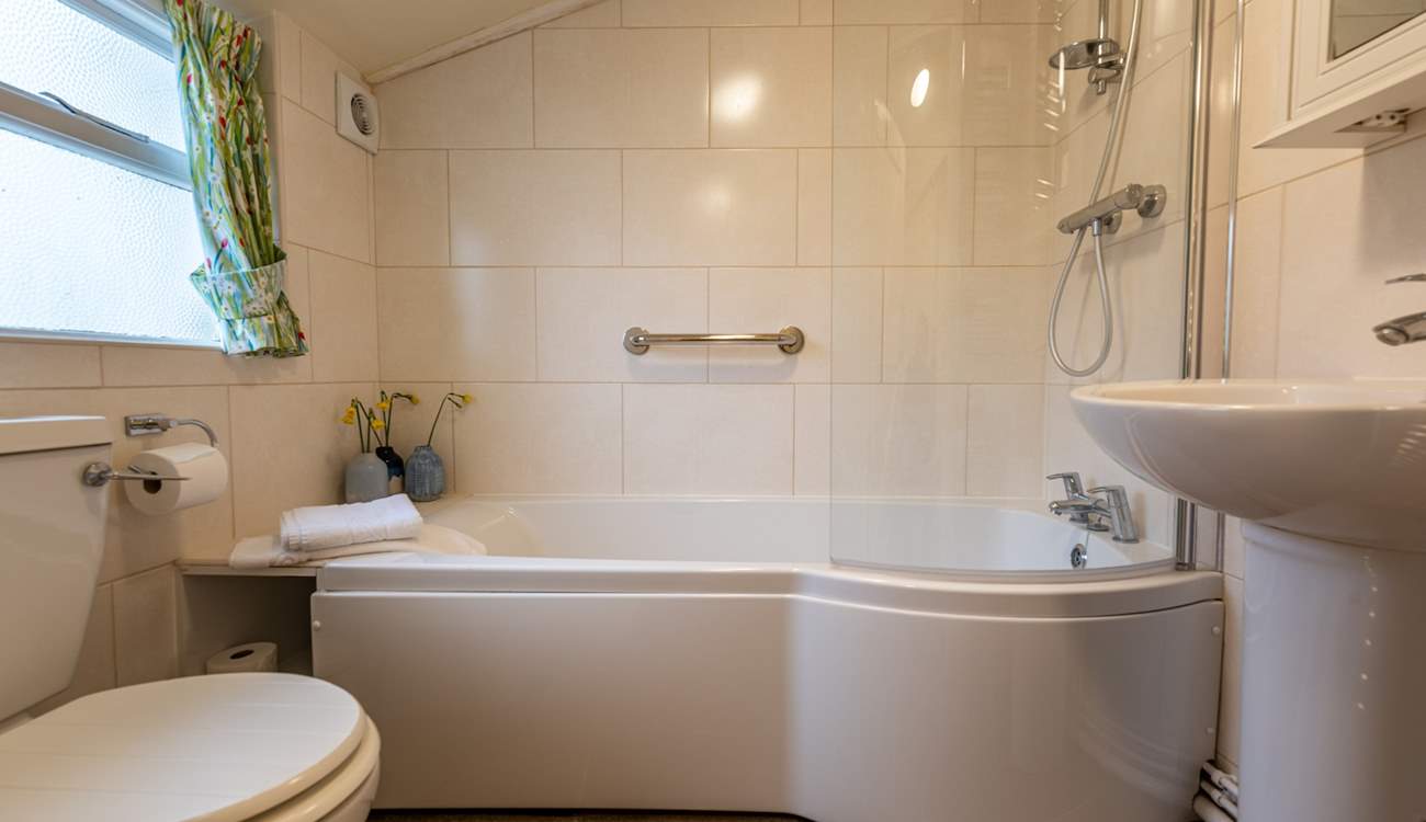 The modern ground-floor bathroom is a lovely bright space.