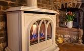 You will find it difficult to tear yourself away from this lovely wood-burner effect gas stove. - Thumbnail Image