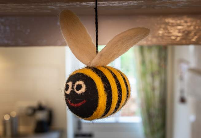Bee careful to not bump your head on the low lintels! These super sweet bees will help to remind you to take care.