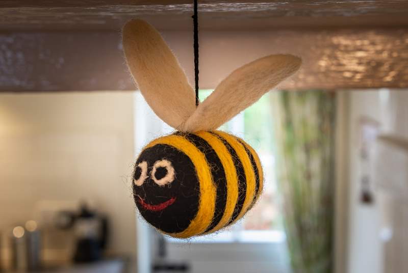 Bee careful to not bump your head on the low lintels! These super sweet bees will help to remind you to take care.